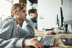 Educational Institution Prints: Students learning in computer classroom