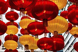 Colorful Decorations Prints: A stunning array of red and yellow lanterns brightly illuminated