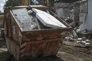 Abandoned Construction Site Prints: Styrofoam placed in a construction waste container