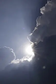 Cloudy Germany Prints: Sun breaking through clouds, Summer, Germany