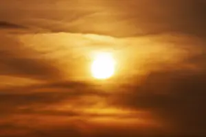 Deserted Evening Sky Prints: Sun behind cloud cover, sunset