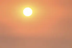 Evening Atmosphere Prints: Sun in cloudy sky, shortly in front of sunset