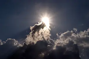Cloud Formation Prints: Sun behind dark clouds
