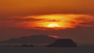 Dodecanese Islands Landscape Prints: Sun setting behind the horizon