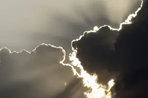 Cloudy Sky Prints: Sun behind storm clouds