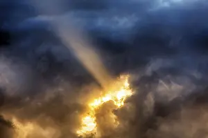 Dramatic Evening Sky Prints: Sunbeam through gap in clouds, dramatic evening sky