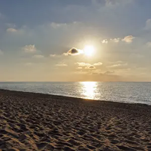 Coastal Landscape Italy Prints: Sunbeams in a slightly cloudy sky