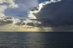 Northern Germany Landscapes Prints: Sunrays shining through clouds over the sea