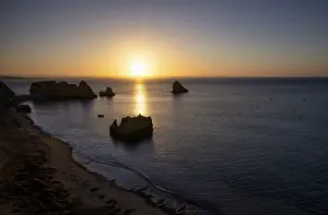 Sunrise On The Beach Prints: Sunrise on the beach, rocks, cliffs