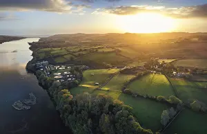 Sunrise Over River Teign Prints: Sunrise over Fields and River Teign from a drone