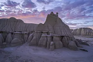 Panoramic View Of Desert Landscape Prints: Sunset casts a soft glow over the dramatic