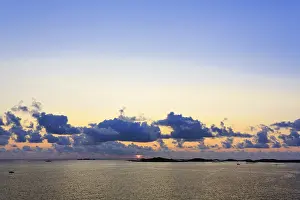United Kingdom Travel Photography Prints: Sunset behind clouds, Archipelago