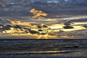 Evening Light In The Netherlands Prints: Sunset with clouds on the beach