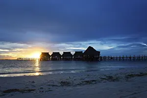 Cloudy Skies At Sundown Prints: Sunset with clouds on the Kae beach