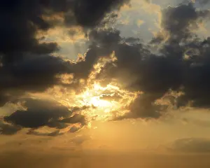 Deserted Outdoor Scene Prints: Sunset in a dramatic cloud filled sky