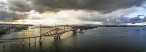 UNESCO World Heritage Site Panorama Prints: Sunset Panorama of Rain clouds over Forth Bridge from a drone