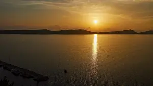 Sunset In Southern Europe Prints: The sunset is reflected in the sea