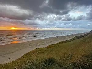 Evening Sky Over The Sea Prints: Sunset over the sea under a dramatic