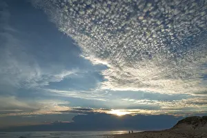 Backlit Coastal Photography Prints: Sunset with small cirrocumulus clouds