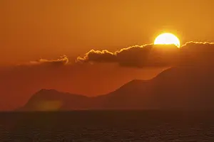 Southern Europe Evening Light Prints: Sunset, sun disc behind clouds