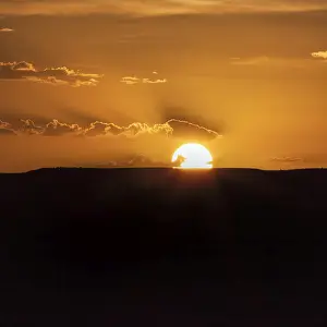 Eroded Desert Scenery Prints: Sunset over Table Mountain, text free space