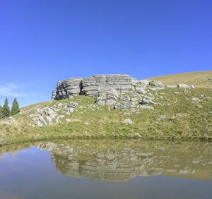 European Karst Landscape Photography Prints: Surface karst rock formations are reflected in a pond