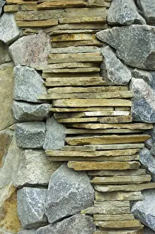 Uninhabited Stonewalls Prints: Surface of the stone wall with cracks