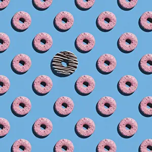 Blue Background Food Photography Prints: Sweet donuts pattern on a blue background