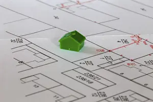 New Housing Estate Prints: Symbolic image of building: Model house on a development plan