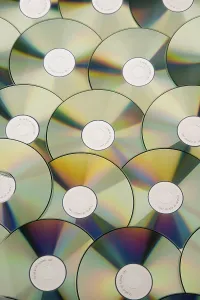 Electronic Data Backup Prints: A table full of CD-ROM and DVD