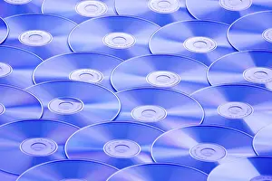 Studio Photography Equipment Prints: A table full of CD-ROM and DVD