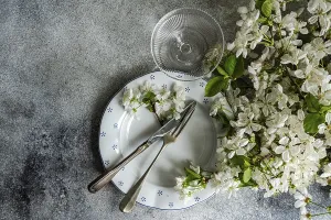 Vintage Table Setting Prints: A table setting features vintage cutlery on a patterned plate