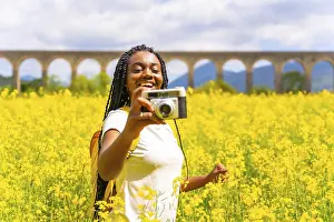 Vintage Camera Photography Prints: Taking photos smiling with a vintage camera