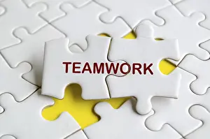 Teamwork Concept Prints: Teamwork text on missing jigsaw puzzle