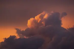 Cloudy Atmospheric Light Prints: Thundercloud illuminated by the evening sun