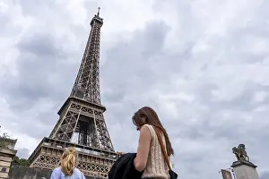 Paris Landmark Photography Prints: Two tourists at the Eiffel Tower