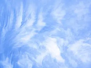 Deep Blue Background Prints: A tranquil sky with wispy white clouds set against a backdrop of deep blue