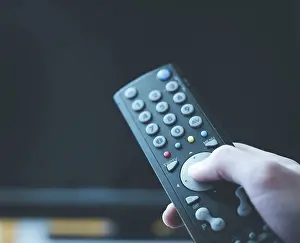 Deserted Architecture Prints: TV remote control in the foreground