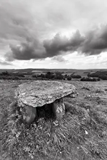 Ireland Dolmen Prints: Unknown dolmen in a meadow, dramatic cloudy sky