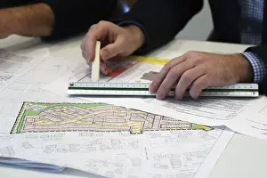 Urban Development Plan Prints: Urban development plan on a desk