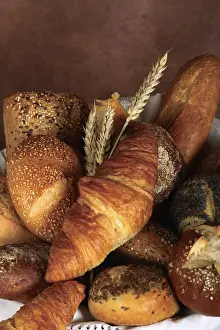 Pastry And Baked Goods Prints: Various rolls in a basket