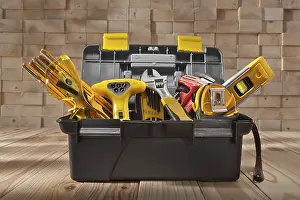 Measuring Tape Concept Prints: Various work tools in a small black toolbox