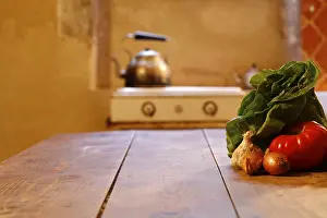 Wooden Table Prints: Vegetables on a wooden table in a rustic kitchen