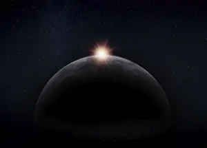 NASA Space Images Prints: View of the dark hidden side of the Moon with the Sun behind it