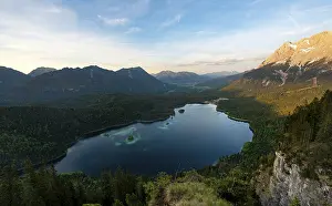 Evening Atmosphere In Bavaria Prints: View over the Eibsee lake at sunset