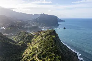 Uninhabited Rocky Coastlines Prints: View of forest-clad cliffs and mountains