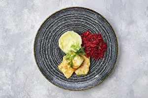 Prints of Top view of fried hake in breading with mashed potato and roasted beetroot Hake Prints: Top View Print of Fried Hake with Mashed Potato and Beetroot
