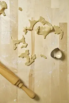 Top View Image Prints: Top view of kitchen table with rests and cuts of cookie dough