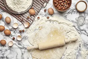 Kitchen Utensil Detail View Prints: Top view of a kitchenware and baking ingredients on a marble table background