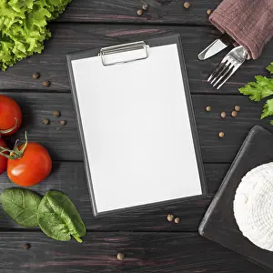 Deserted Kitchen Table Setup Prints: Top view empty menu with tomatoes spinach